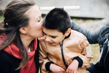 woman caring for disabled child